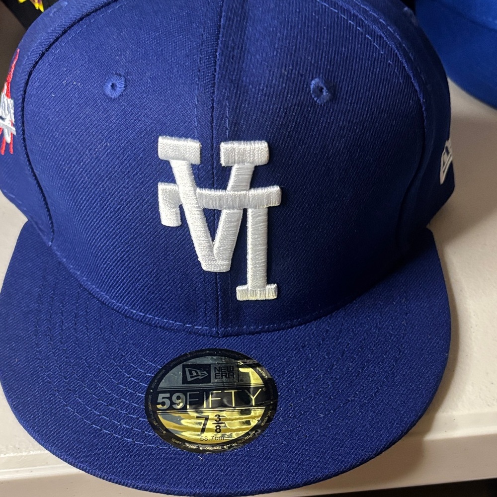 New Era Royal Blue Fitted Cap with White Raised Logo